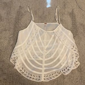 White Free People tank top with cut outs